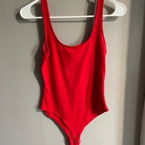 Red tank top body suit